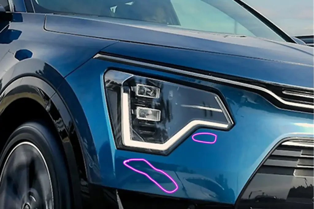 A blue car with damage indicators on it